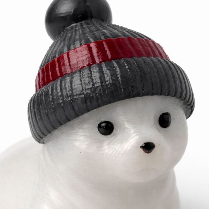 фигурка тюлень белёк белый в шапочке игрушка на ёлку сувенир